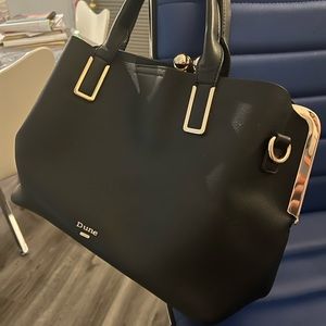 Dune black handbag with gold accents! Three sections.